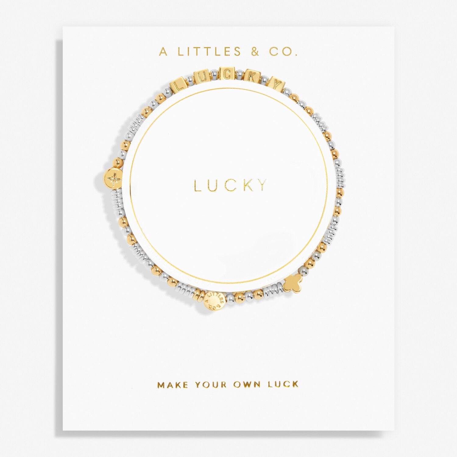 Bracelet with gold and silver beads on a white card with 'A Littles & Co.' branding. Available at Be Charmed