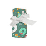 Angel Dear Christmas Treats Swaddle Blanket with soft fabric and festive holiday print, available at Be Charmed.