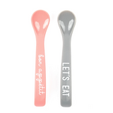 Bella Tunno "Let's Eat" & "Bon Appetit" Wonder Spoon Set in goldenrod yellow and gray, featuring ergonomic handles and fun designs, available at Be Charmed.
