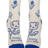 Pair of socks with floral design and 'Pretty Anxious' text on a white background. Available at Be Charmed