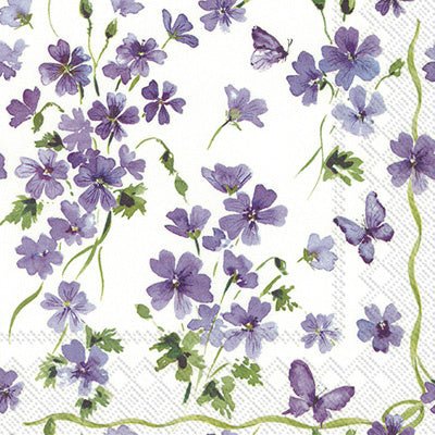 Boston International Purple Spring cocktail napkins featuring delicate lilac-purple floral patterns on 3‑ply paper, available at Be Charmed.