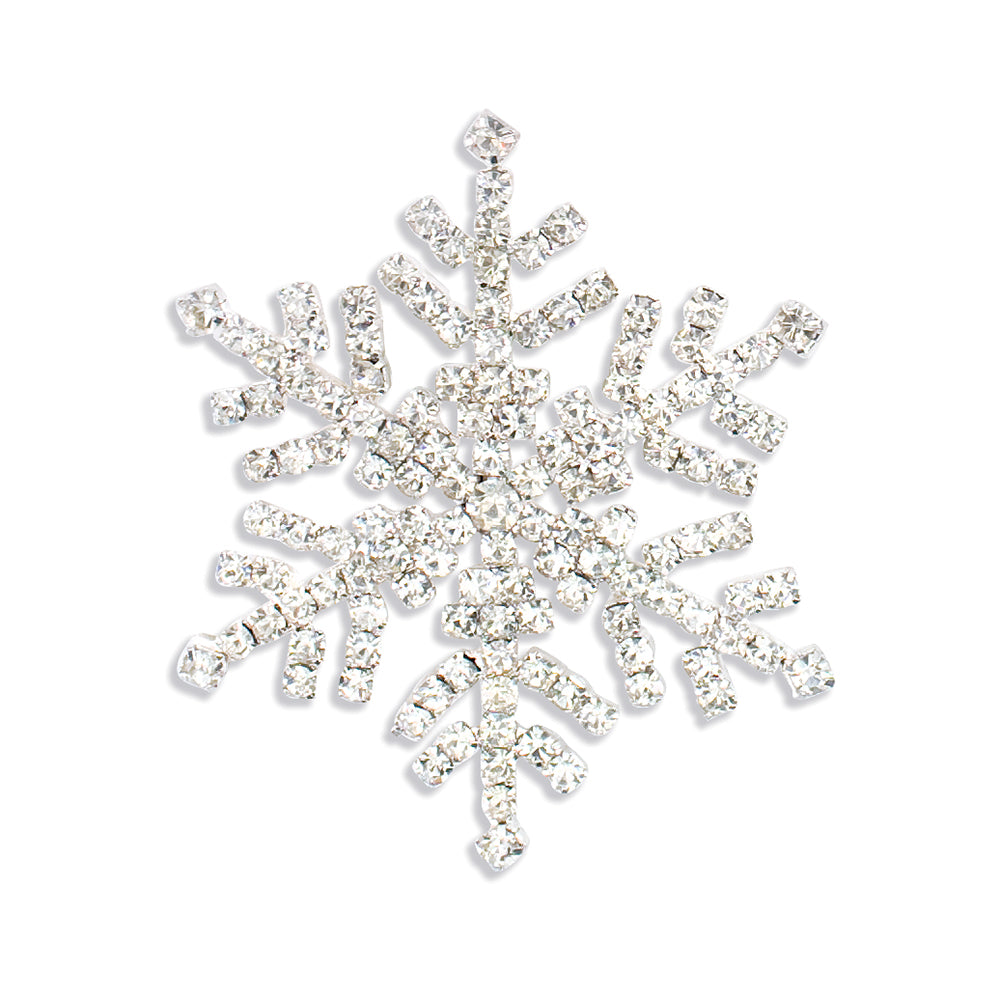 Decorative snowflake Pin with rhinestones on a white background. Available at Be Charmed.
