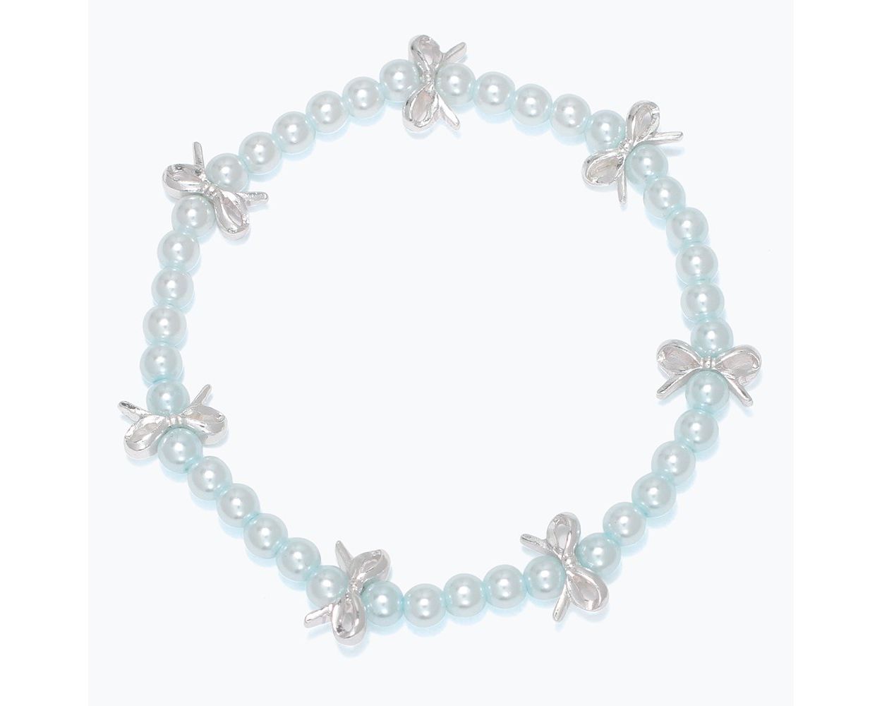 Kids bracelet with light blue pearls and silver bow charms on a white background. Available at Be Charmed.