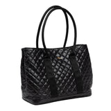 Scout Miss Manors Black quilted handbag with gold logo on a white background. Available at Be Charmed