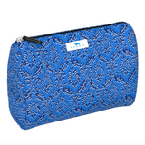 Merci Beau Blue SCOUT Packin’ Heat Cosmetic Bag — 9.75″W × 7″H × 3.75″D coated cotton travel pouch with interior slip pocket, water‑resistant and slim profile. Available at Be Charmed