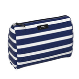 Nantucket Navy SCOUT Packin’ Heat Cosmetic Bag — 9.75″W × 7″H × 3.75″D coated cotton travel pouch with interior slip pocket, water‑resistant and slim profile. Available at Be Charmed