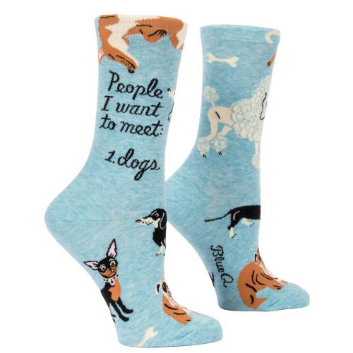 Light blue socks with dog illustrations and text on a white background. Available at Be Charmed