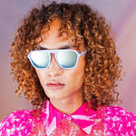 Somone wearing Goodr Roller Rink Royalty Sunglasses 
