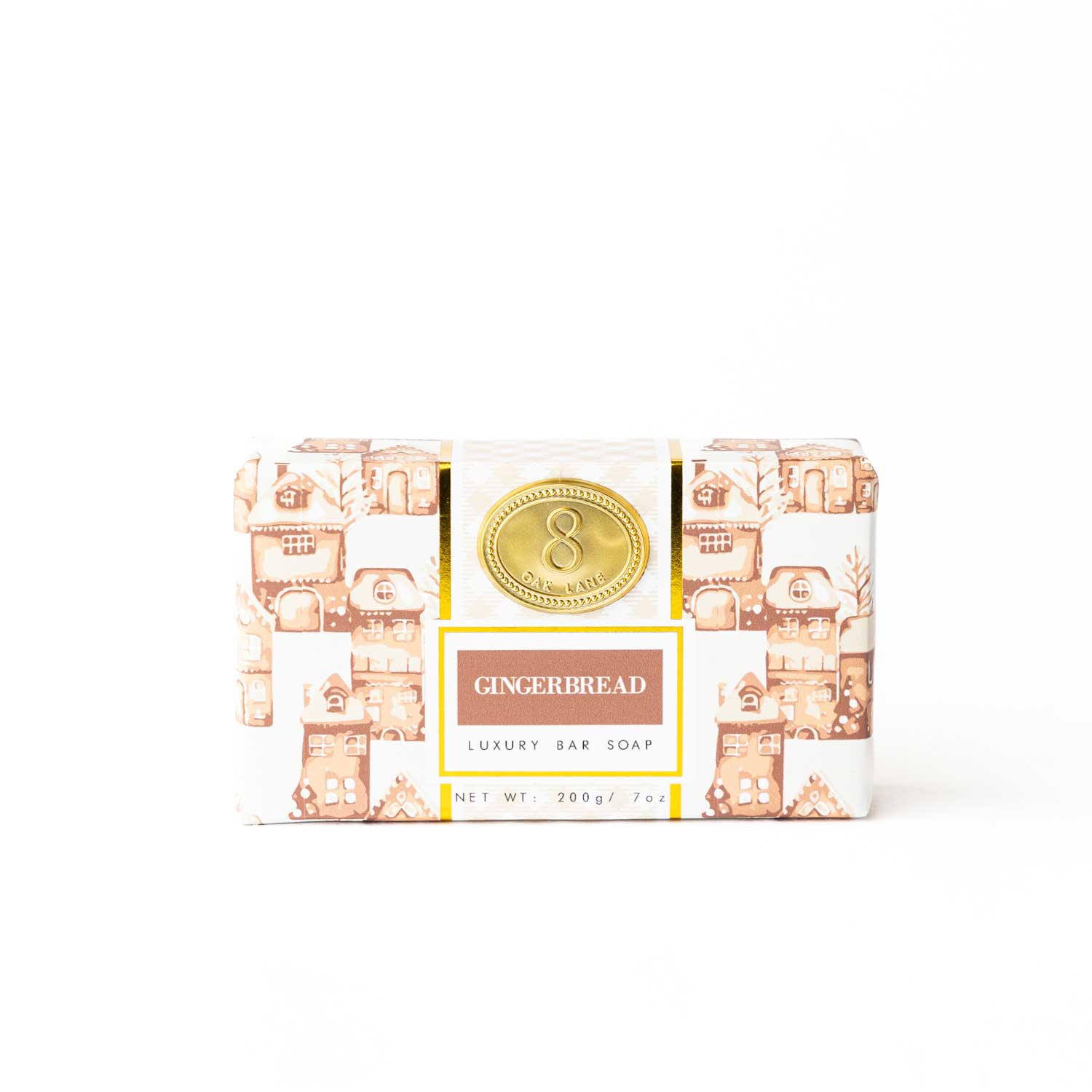 Gingerbread-themed soap bar in a decorative packaging on a white background. Available at Be Charmed. 