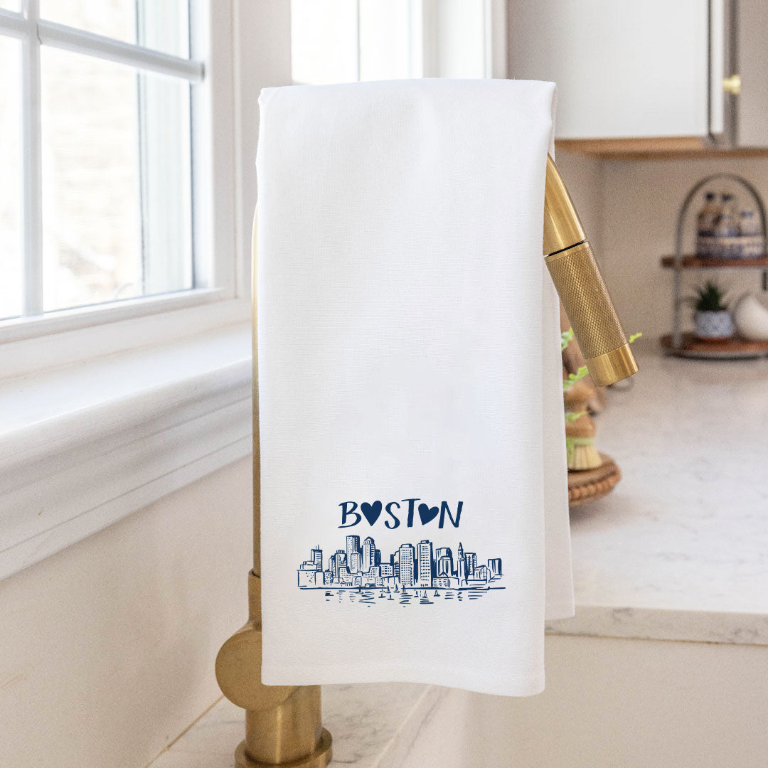Rustic Marlin Boston Heart Skyline Tea Towel in Navy Draped over gold faucet