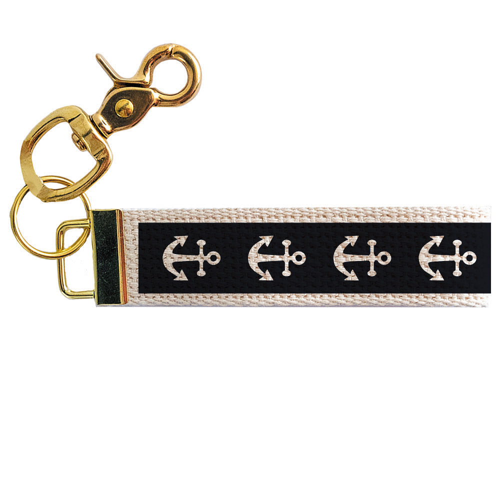 Keychain with anchor pattern on a black band against a white background. Available at Be Charmed
