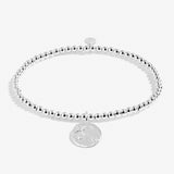 A Littles Co teacher Silver beaded bracelet with a round charm on a white background. Available at Be Charmed