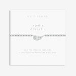 Silver angel wing necklace on a white card with 'A Littles & Co' branding. Available at Be Charmed