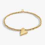 A Littles & Co Gold Best Friend BraceletGold Best Friend stretch bracelet by A Littles & Co with heart charm – Available at Be Charmed