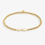 Bride To Be gold bracelet by A Littles & Co, gold-tone stretch charm bracelet for future brides. Available at Be Charmed.
