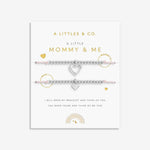 Silver bracelet set with heart charms on a white background, featuring 'A Littles & Co.' branding. Available at Be Charmed