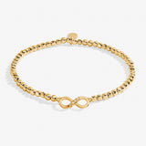 Gold A littles Co friendship bracelet with a clasp on a white background. Available at Be Charmed