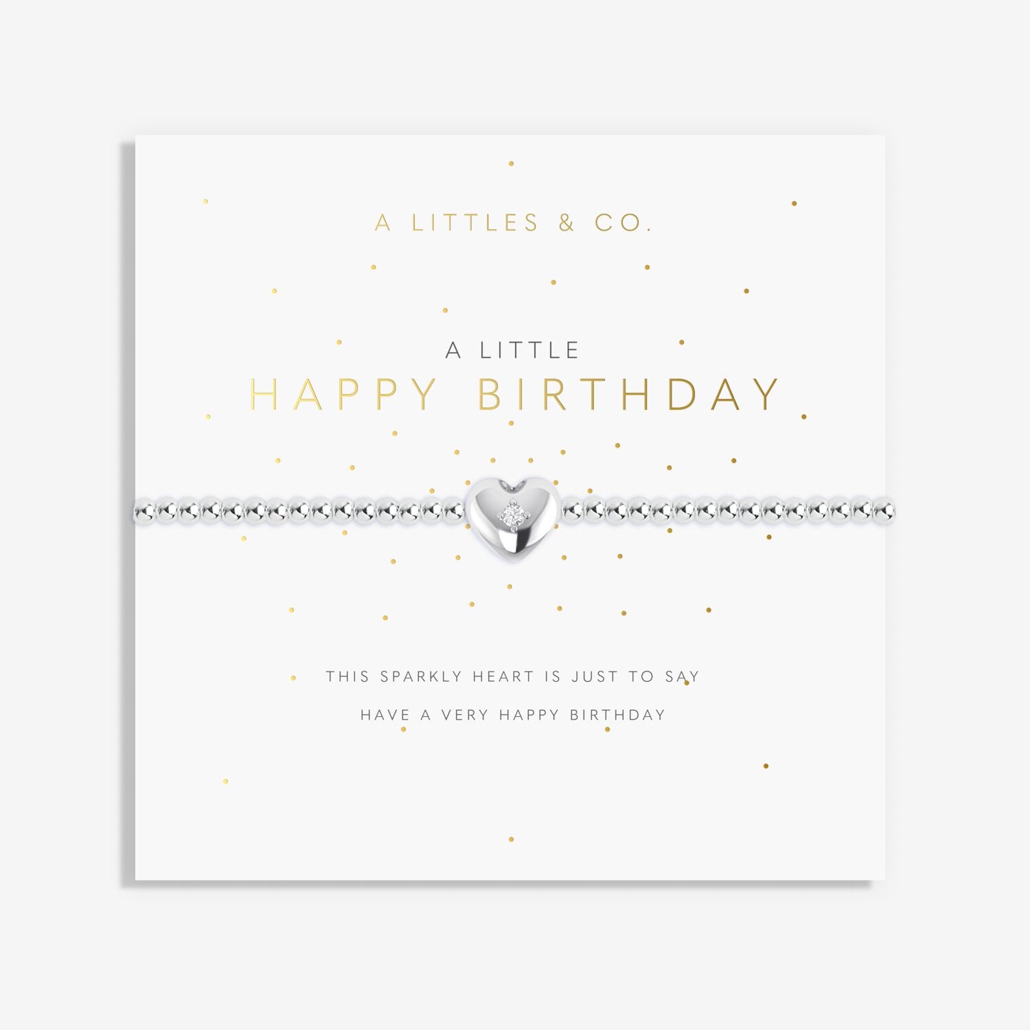 Silver heart bracelet on a white card with 'A Littles & Co' branding and text. Available at Be Charmed