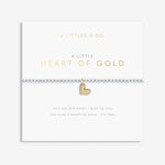 Gold heart bracelet on a white card with 'A Littles & Co' branding. Available at Be Charmed