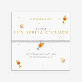 A Littles & Co It’s Spritz O’Clock silver bracelet with a playful charm on card, perfect for gifting and everyday wear. Available at Be Charmed