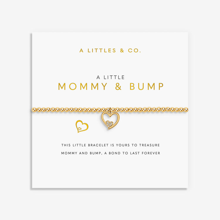 A Gold bracelet with heart-shaped charms on a white card with 'A Littles & Co.' branding. Available at Be Charmed