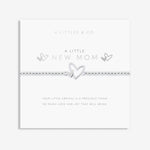 Silver bracelet with heart design on a white card with text, featuring 'A Littles & Co' branding. Available at Be Charmed