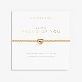 Gold bracelet with heart charm on a 'A Littles & Co.' card. Available at Be Charmed