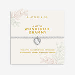 A Little & Co Silver bracelet with heart charm on a white card with text and branding. Available at Be Charmed