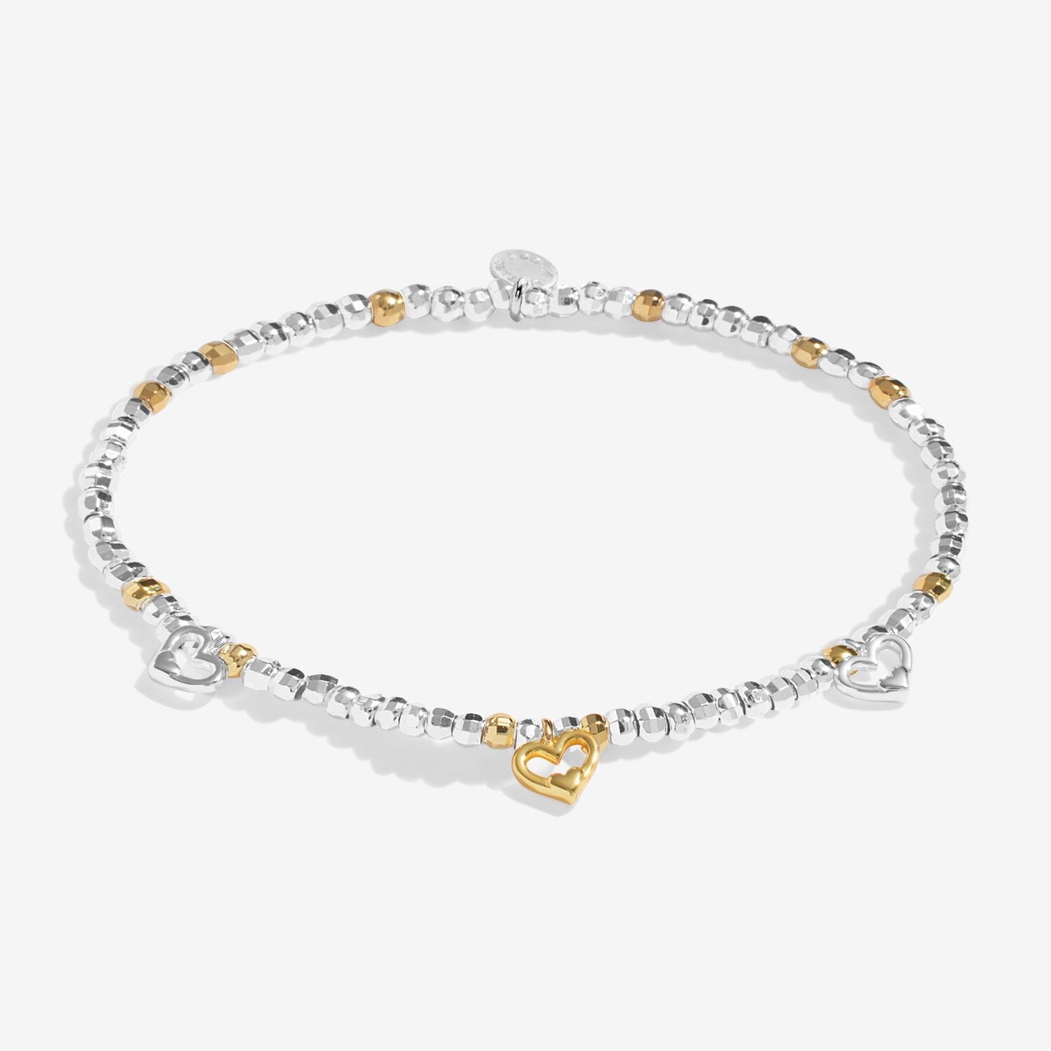 Bracelet with heart-shaped charms on a white background. Available at Be Charmed