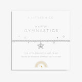Children's gymnastics bracelet with silver plating, featuring a beaded design and a gymnastics star charm, presented on a card with 'A Littles & Co. A Little Gymnastics' printed on it. Available at Be Charmed