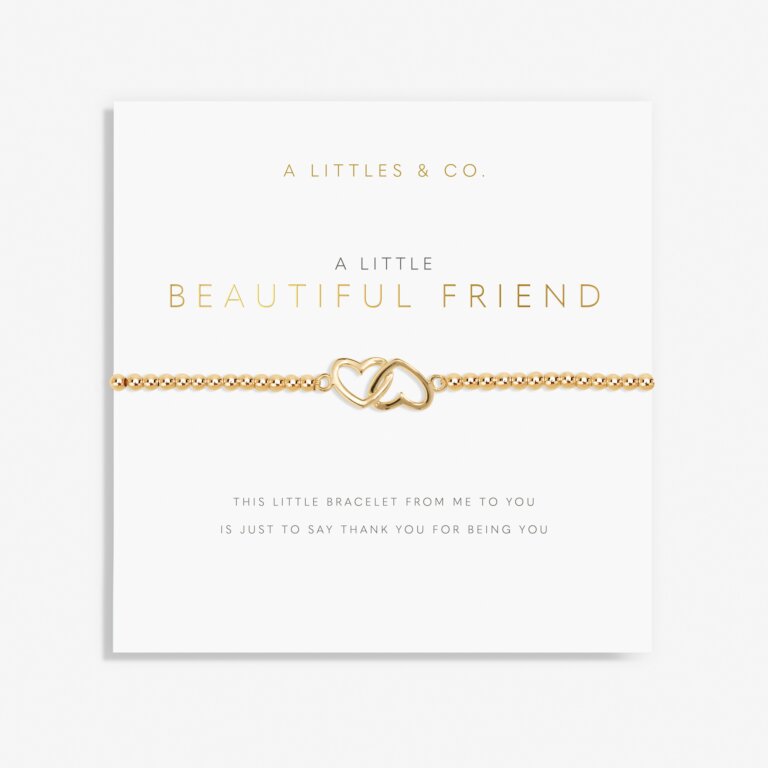 A gold-tone plated bracelet with a mother of pearl pendant, presented on a card with the text 'A Littles & Co. A LITTLE BEAUTIFUL FRIEND'. Available at Be Charmed