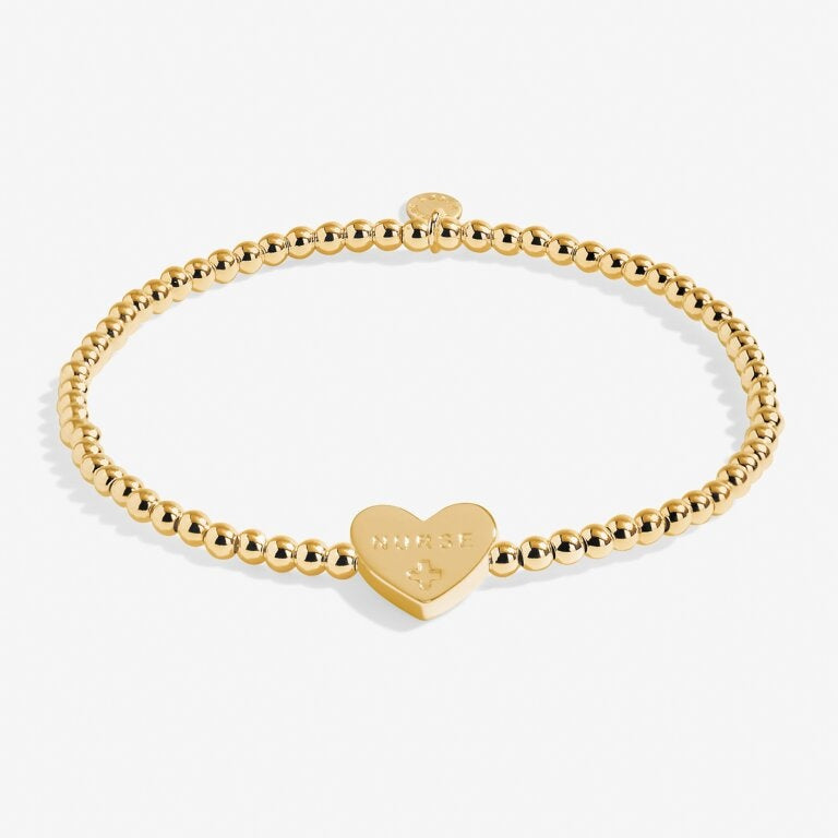 A Littles & Co Gold Caring Nurse Bracelet featuring delicate gold finish with caring nurse engraving—perfect gift to appreciate healthcare heroes from Be Charmed.