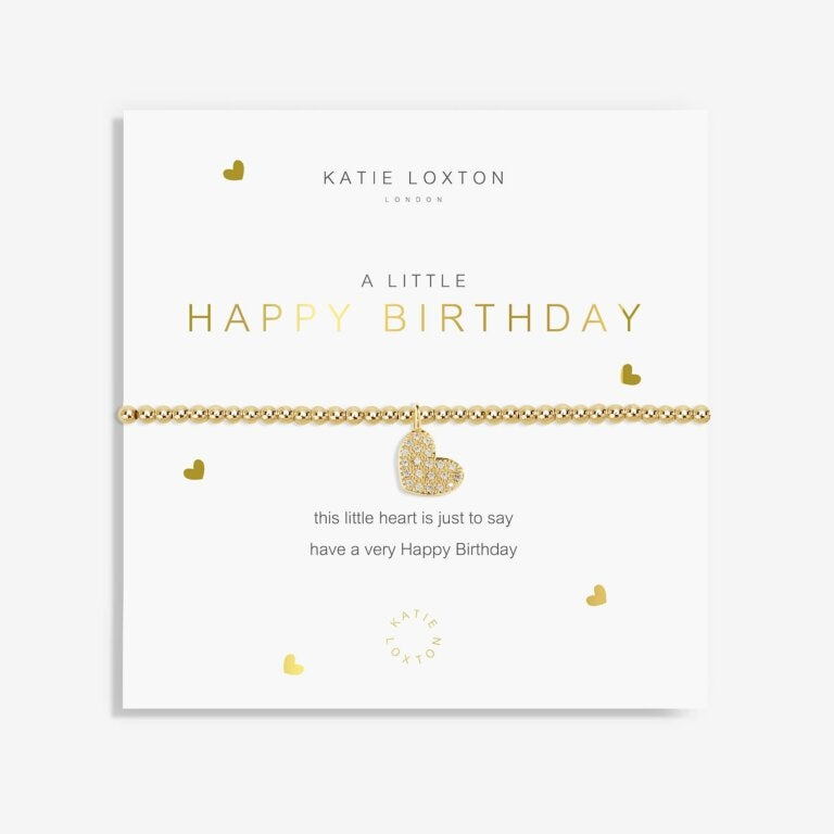 A Littles & Co Gold A Little Happy Birthday Bracelet with a delicate gold-plated charm on a stretch bead band, displayed on a heartfelt birthday sentiment card, a charming gift available at Be Charmed 