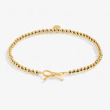 A Littles & Co Gold Thank You Bracelet—elegant gold charm bracelet with heartfelt thank-you message, perfect appreciation gift from Be Charmed. 