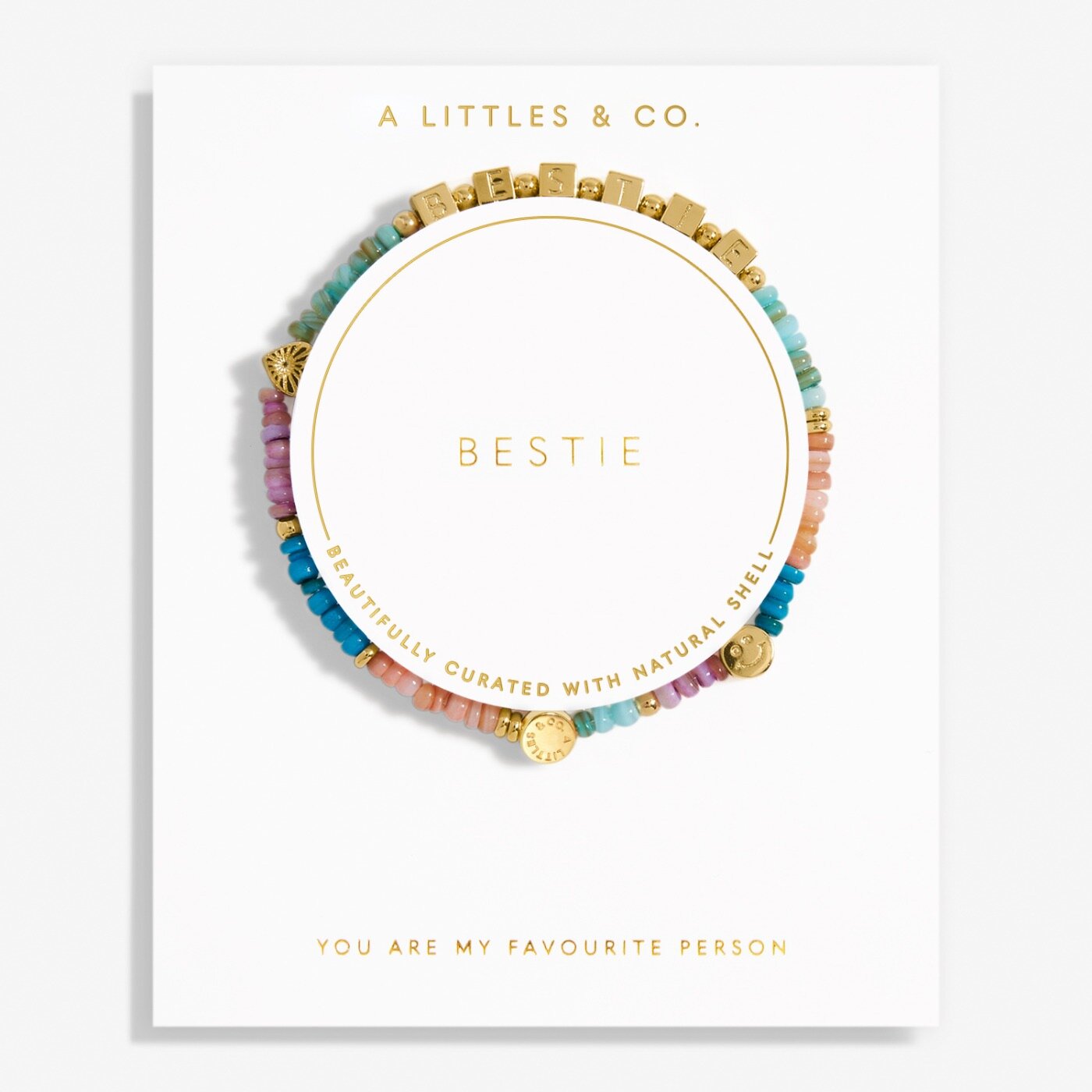 Colorful beaded bestie bracelet on a white card with 'A Littles & Co.' branding. Available at Be Charmed. 