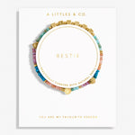 Colorful beaded bestie bracelet on a white card with 'A Littles & Co.' branding. Available at Be Charmed. 