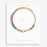 Colorful beaded bestie bracelet on a white card with 'A Littles & Co.' branding. Available at Be Charmed. 