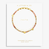 Bracelet with gold and multicolored beads on a white card with 'A Littles & Co.' branding. Available at Be Charmed