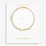 Bracelet with gold and silver beads on a white card with 'A Littles & Co.' branding. Available at Be Charmed