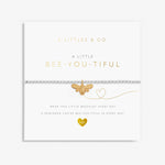 A Littles & Co Kids' Bee-You-Tiful Silver Bracelet featuring a silver-plated bumblebee charm on a stretch bead band, displayed on a playful message card reminding children to be themselves, a sweet and encouraging gift available at Be Charmed