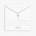 A Littles & Co Kids' First Holy Communion Silver Necklace displayed on card—delicate and meaningful keepsake with symbolic charm, perfect for gifting from Be Charmed.