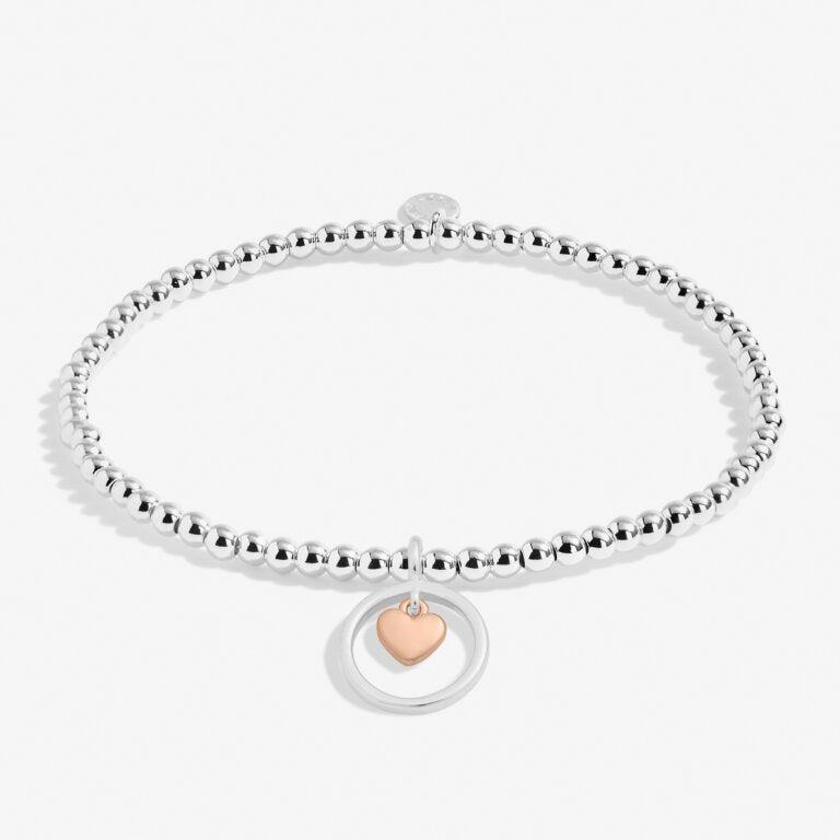 A Littles & Co Kids' Lovely Granddaughter Bracelet in silver and rose gold—delicate design, perfect keepsake gift from Be Charmed.