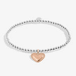 A Littles & Co Lovely Daughter Children’s Bracelet in silver and rose gold—delicate design, perfect gift for daughters from Be Charmed.