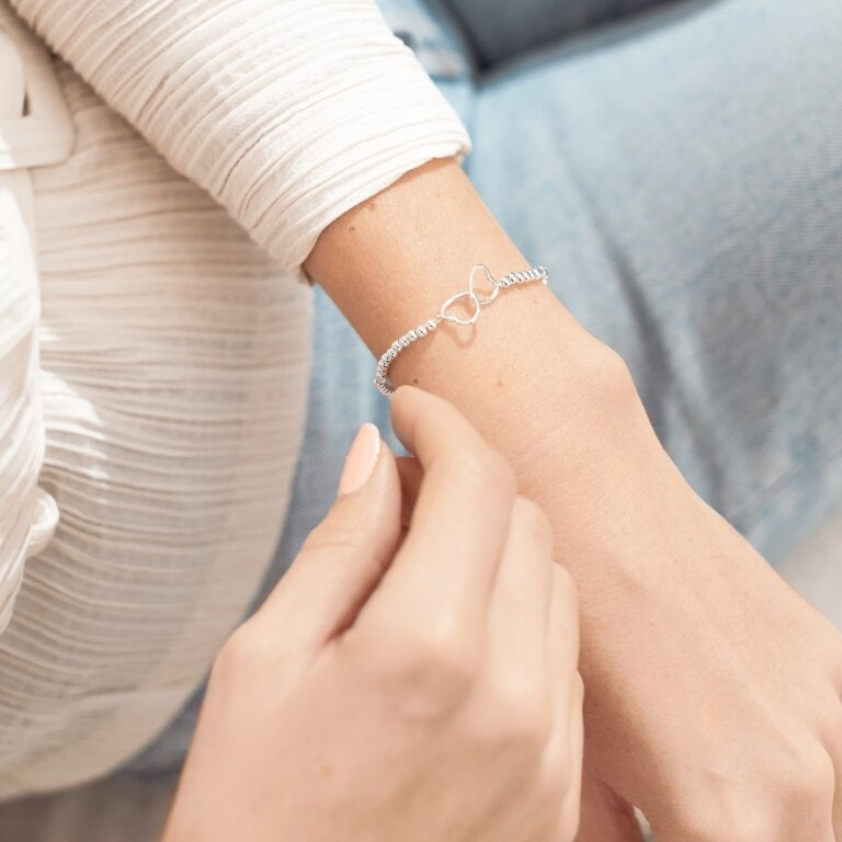 Woman Wearing A Littles & Co Silver Friendship Bracelet