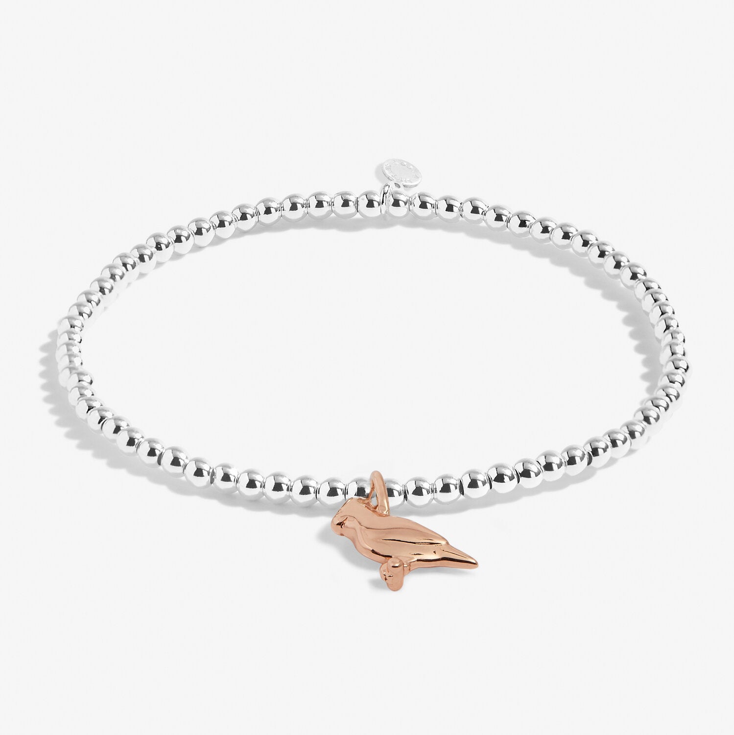 A Littles & Co Red Cardinal Silver Bracelet featuring a silver-plated stretch band with a detailed red cardinal charm, a meaningful gift available at Be Charmed
