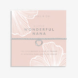 A silver-plated bracelet with a beaded design and a heart charm, presented on a blush pink card with 'WONDERFUL NANA' written on it. Available at Be Charmed