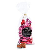 Bag of milk and dark chocolate hearts with Abdallah brand on a white background. Available at Be Charmed