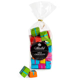 Bag of colorful Abdallah milk chocolate bars with abel on a white background. Available at Be Charmed
