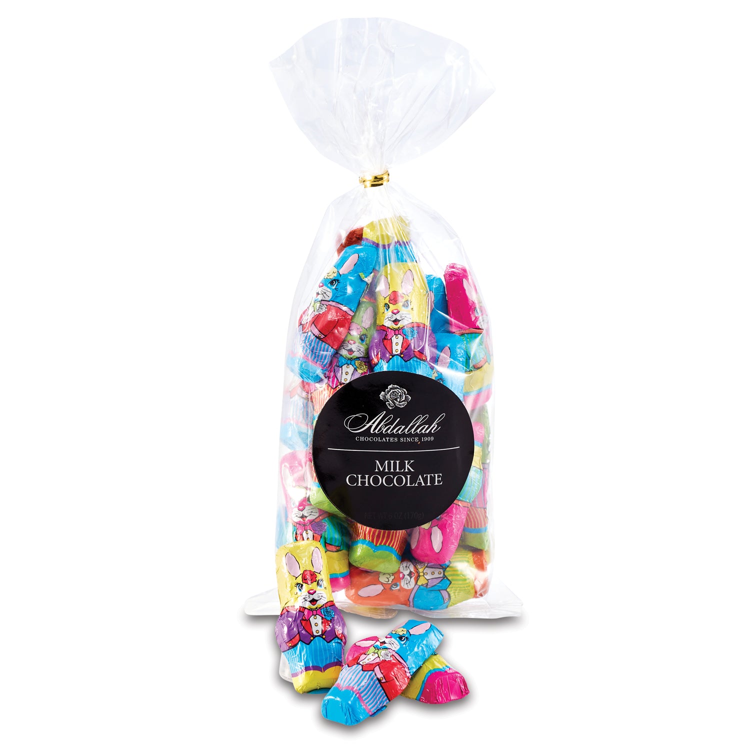 Bag of colorful milk chocolate candies with 'Abdallah' branding on a white background. Available at Be Charmed