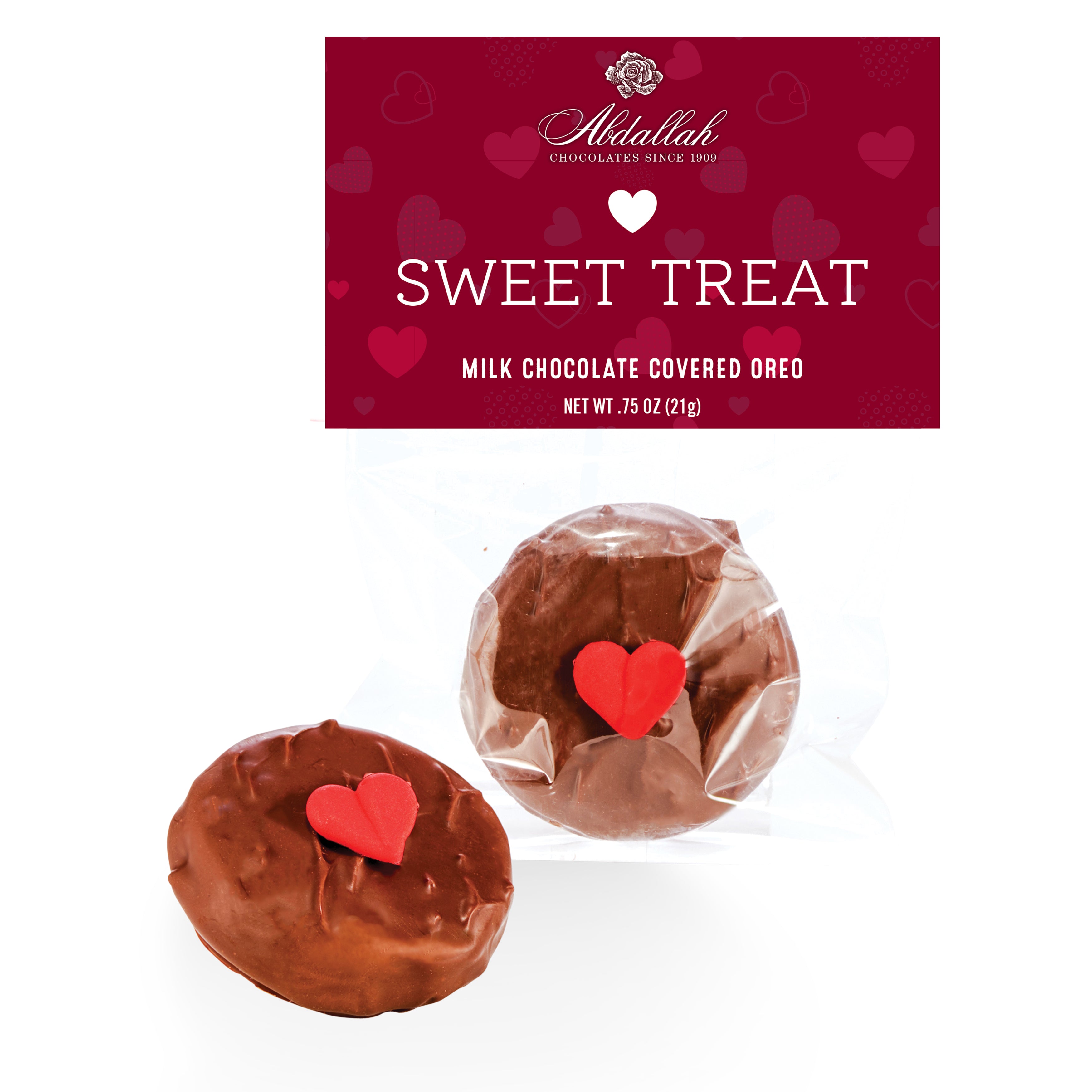 Milk chocolate-covered Oreo with a red heart on a white background, featuring Abidallah Chocolates packaging. Available at Be Chamred